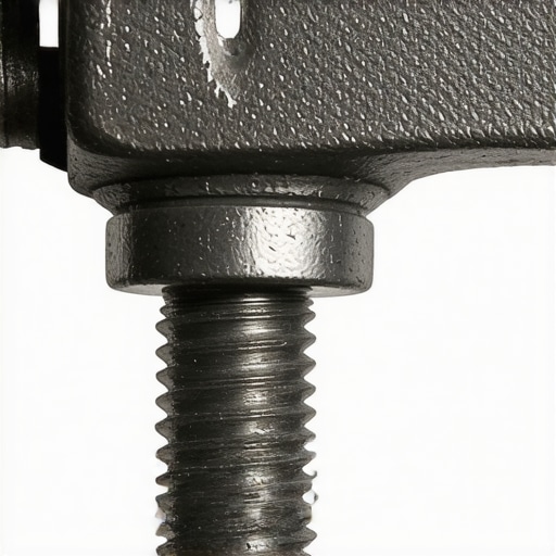 Detailed view of steel clamp's tightening screw with textured grip
