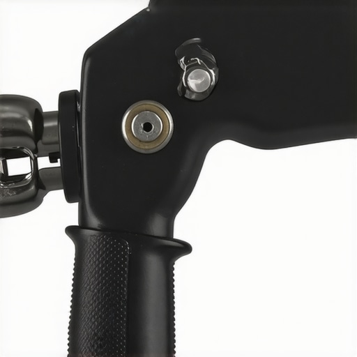 Handheld screw fixer with textured grip and ratchet mechanism in use