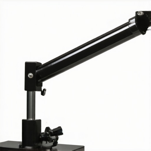 Close-up of a metal desk clamp attached to a desk with an adjustable arm and camera mount.