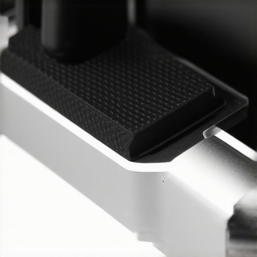 Close-up of high-friction rubber pad installation on a camera plate.